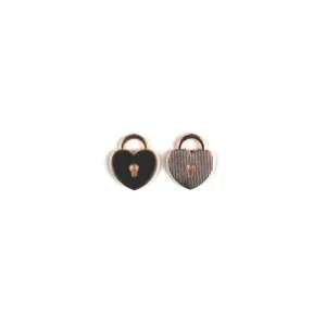 Close-up detail shot of heart-shaped lock pendants, alloy material and enamel finish.