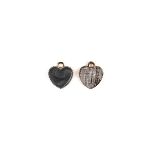 Close-up detail of black oil drop heart alloy pendant showing front and textured back side