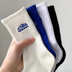 Men's cotton mid-tube socks with snow mountain embroidery, stylish sports crew socks.