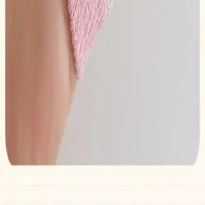 Pink knit sock detail view, soft breathable mesh fabric texture close up shot for daily wear.