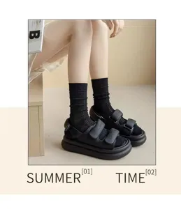 Black platform sandals paired with cozy black socks for women stylish summer casual daily wear outfit