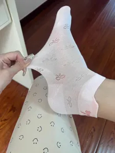 Women thin pink mesh short socks with cute bow patterns, breathable and elastic design.