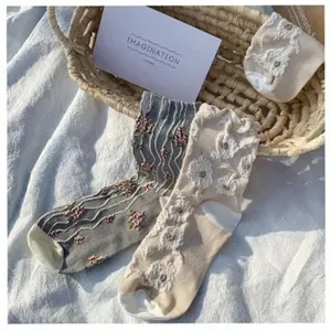 Chic embroidered mid-calf socks for women, vintage floral design, comfortable casual cotton wear.