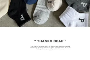 Comfortable athletic ankle socks with stylish knit letters, breathable and sweat-absorbent.