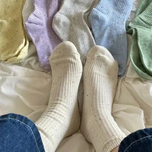 Comfortable cotton ribbed mid-calf socks with colorful speckles, cozy daily wear detail shot.