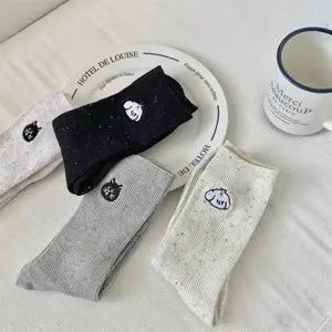 Cute speckle yarn mid-tube socks with sweet embroidered cat and dog designs for women.
