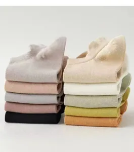 Close-up detail of women summer thin low cut boat socks with pull ear design, multi colors.