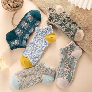 Detailed view of vintage palace embossed short socks with delicate floral lace and breathable mesh.