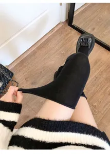 Black over-the-knee knit socks detail, showing high elasticity and ribbed texture design.