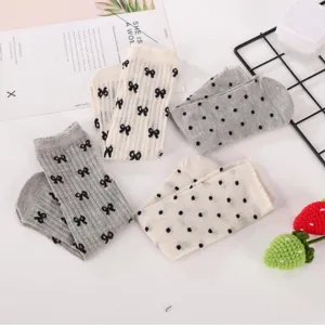 Sweet ballet style mesh crew socks with cute bows and polka dots, perfect for summer wear.
