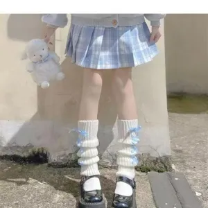 Japanese cute knit leg warmers with blue ribbons, cozy winter Lolita slouch socks for women.