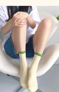 Cute women summer mesh breathable candy color mid tube socks Japanese style details view.