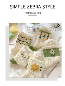 Cute green mid-calf socks with floral and stripe patterns, sweet Japanese style for women.