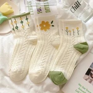 Japanese style sweet floral embroidered mid-tube socks, comfortable knit cotton material.