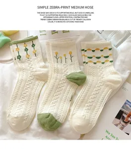 Green floral knit mid-calf socks for women, stylish Japanese ins style cute casual socks.