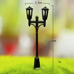 Miniature plastic double head street lamp for DIY moss landscape and micro gardening decor.