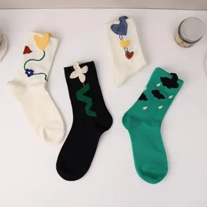 Cute aesthetic mid-tube socks featuring 3D floral, heart, and cloud designs for daily wear.
