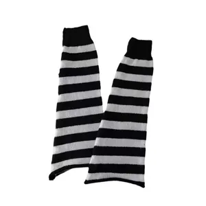 Classic black and white striped knitted leg warmers for stylish daily wear and outfits.