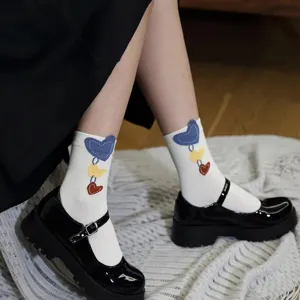 Women white mid-calf socks featuring cute 3d heart pendant design stylish fashion wear
