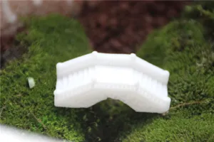 Miniature white bridge figurine for micro landscape, detailed close-up moss scene decor
