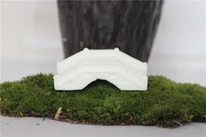 White resin miniature bridge for micro landscape decoration and fairy garden DIY crafts.