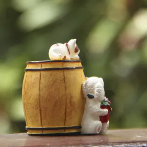Miniature cat and dog wine barrel figurine, detailed close-up of succulent plant insert.