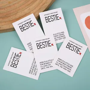 Detailed shot of pocket hug bestie greeting cards, premium paper craft for friendship gift.