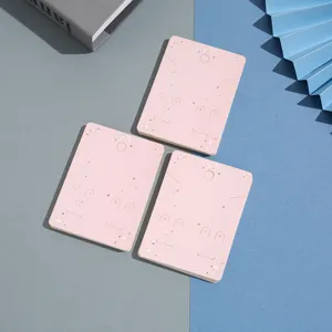 Detail view of pink starry jewelry display cards for showcasing earrings, necklaces and rings.