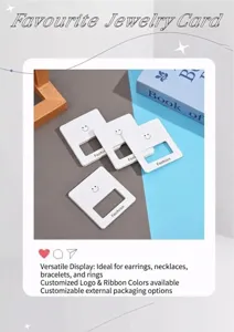 White smiley face jewelry display cards for earrings necklaces rings and bracelets packaging.