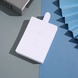 Detail shot of white foldable ring display card, perfect for jewelry packaging and retail.