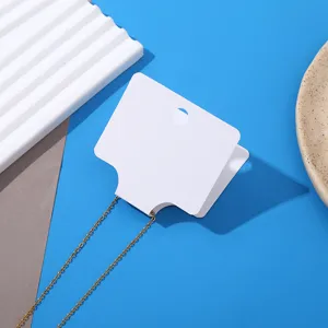 Blank folded necklace display cards white paper packaging card for jewelry retail and craft.