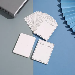 White earring display cards paper packaging for retail jewelry store accessories display.