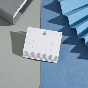 White multi-hole earring display cards detail shot, premium paper jewelry packaging.