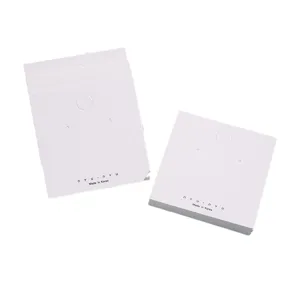 White paper jewelry display cards for earrings and necklaces, professional packaging holders.