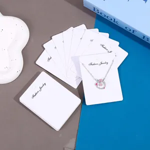 White necklace display cards set with necklace, paper packaging cards for jewelry store retail.