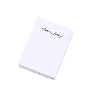 White paper jewelry display cards with necklace slits, simple packaging cards for retail sale.