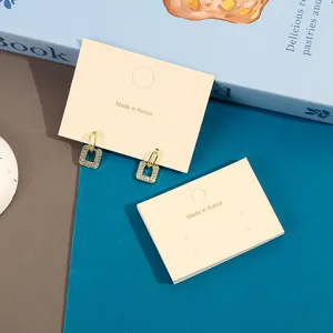 Geometric crystal drop earrings on display card, stylish jewelry for daily wear and party.