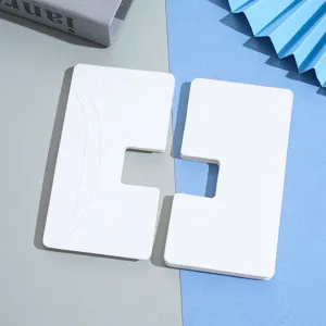 White blank hair claw clip paper card detail view, neat packaging for large hair accessories.