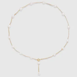 French freshwater pearl station chain necklace detail featuring elegant Y-drop design.