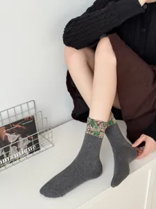 Retro floral cuff grey mid-calf socks detail, cozy vintage style cotton blend everyday wear.