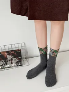 Retro floral mid-calf socks for women, featuring cozy knit fabric and stylish vintage patterns.