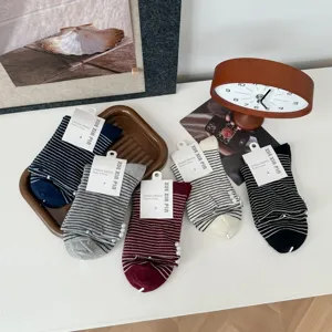 Japanese style striped slouch socks with pearl details, cozy cotton blend for autumn winter.