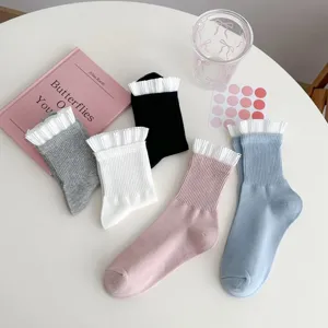 Women cotton mid-calf socks with white ruffled lace trim, breathable solid color cute hosiery detail