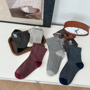 Cute Japanese style striped slouch socks for women, winter long knit socks with pearls.