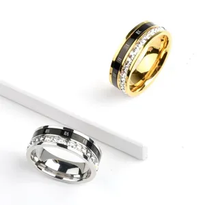 Stainless steel Roman numeral rotating ring with sparkling single row crystal stones.