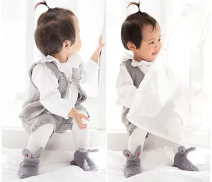 Cute coral fleece baby socks with 3d rabbit ears, soft anti-slip toddler socks for daily wear.