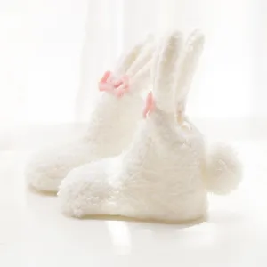 Fluffy white baby bunny socks with cute pink bows and 3d ears for cozy winter daily wear.