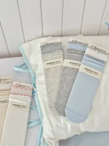 Japanese style sweet ruffle edge mid-tube cotton socks, soft and breathable summer wear.