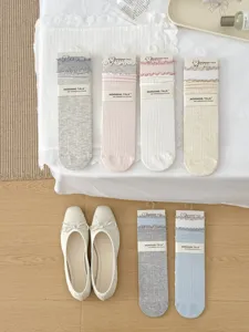 Japanese style women crew socks with double ruffle lace edge, comfortable cotton knit hosiery.