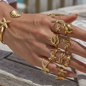 Set de anillos de estrella de mar y concha dorada estilo resort moda playa joyeria
